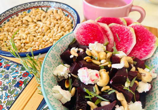 Roasted Beet Salad With Fresh Goat Cheese, Cashews, Pine Nuts, and Watermelon Radish